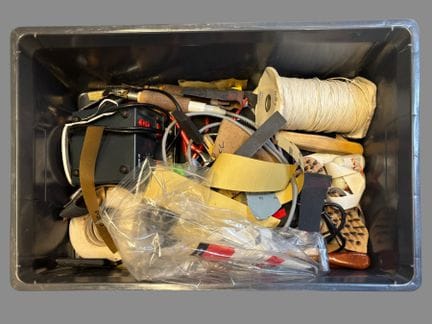 [TOOL SET]
Set of tools including pliers, a utilit
