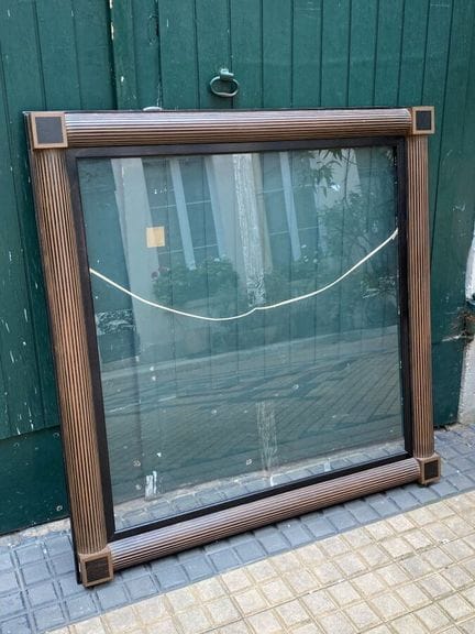 [FRAME]
Carved wooden frame with column motifs. 
P