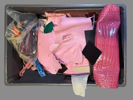 [LEATHER HANDLE]
Lot of leather scraps, including 