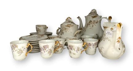 LIMOGES, FRANCE 
Porcelain tea set with polychrome