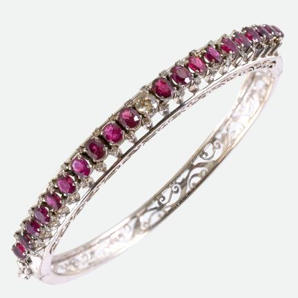 BRACCIALE CON RUBINI E DIAMANTI:
Oggetto decorativ