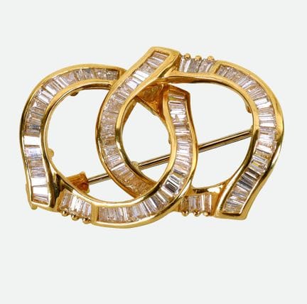 DIAMANT-BROSCHE :
Elegante Arbeit aus Gelbgold 18 