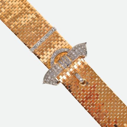 BRACCIALE BRILLANTE:
Elaborata creazione in oro ro