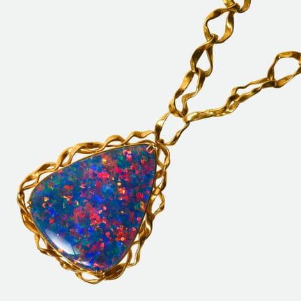 COLLIER OPAL :
Création extravagante en or jaune 1