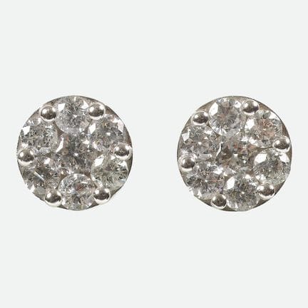 ORECCHINI A PERNO CON BRILLANTI:
Coppia dal design