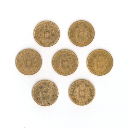 7 monnaies or : 20 FF Napoléon III tête laurée 187