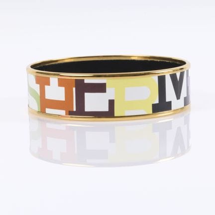 HERMES. Pulsera tipo brazalete ancha «Capitales», 