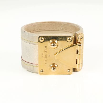 LOUIS VUITTON. Pulsera brazalete "lock" de cuero g