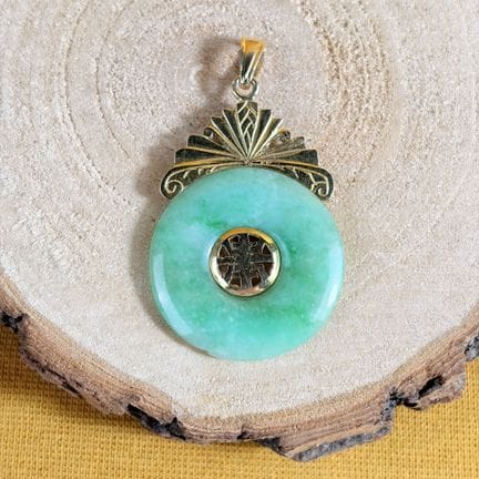 Pendentif en or jaune 750/1000 (18K) orné d'un dis