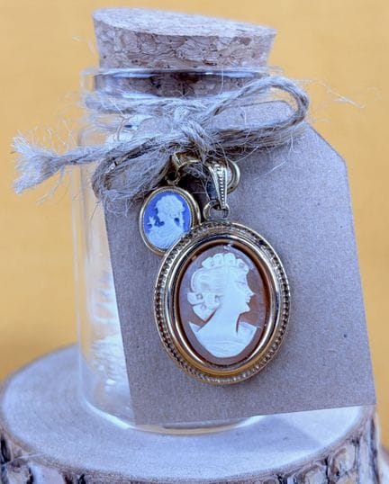 Set composto da due ciondoli in oro giallo 750/100
