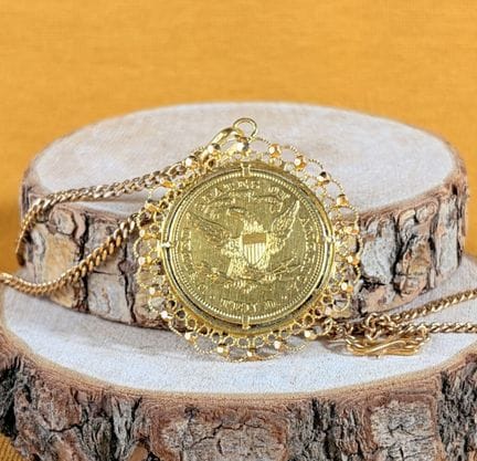 Moneta d'oro da 10 dollari (1880) montata come cio