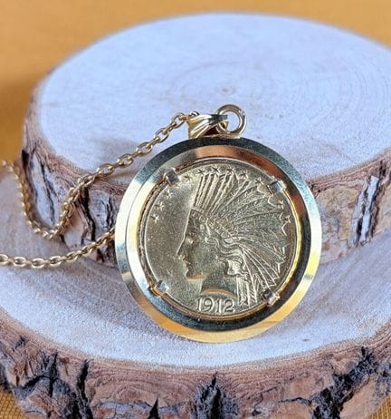Moneta d’oro da 10 dollari (1912) montata come cio