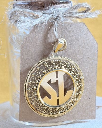 Ciondolo in oro giallo 750/1000 (18 carati) con mo