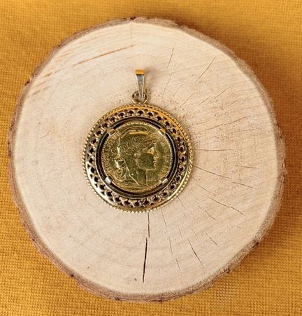 Moneta da 20 franchi d'oro (1914) montata come cio