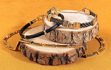 Set composto da tre gioielli in oro giallo 585/100