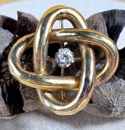 Brosche aus 750/1000 Gelbgold (18 K) in Form eines