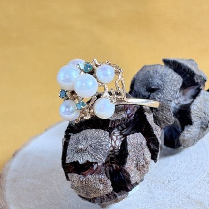 Bague en or jaune 585/1000 (14K) ornée de perles e
