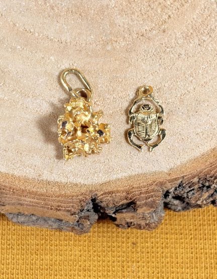 Set composto da due ciondoli in oro giallo 750/100
