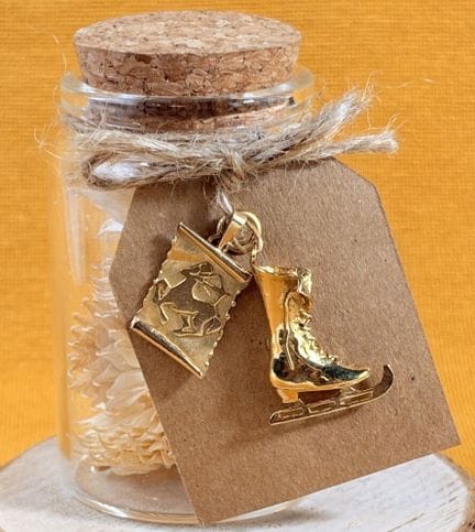 Set composto da due ciondoli in oro giallo 750/100