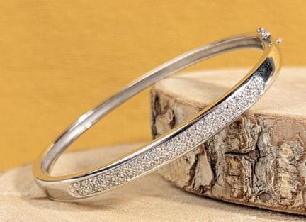 Bracciale semirigido con cerniere in oro bianco 75