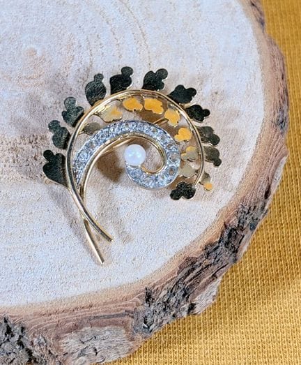 Brosche aus Gelb- und Weißgold 750/1000 (18 K) in 
