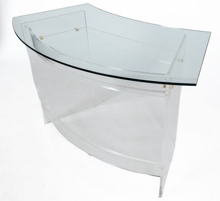 Small, contemporary desk with a rounded shape. Gla