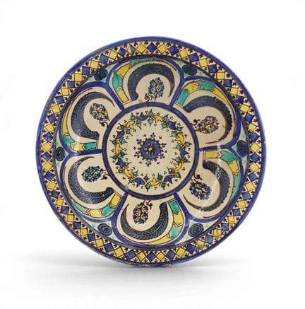 MAROC
Plat rond en céramique à glaçure lustrée à d