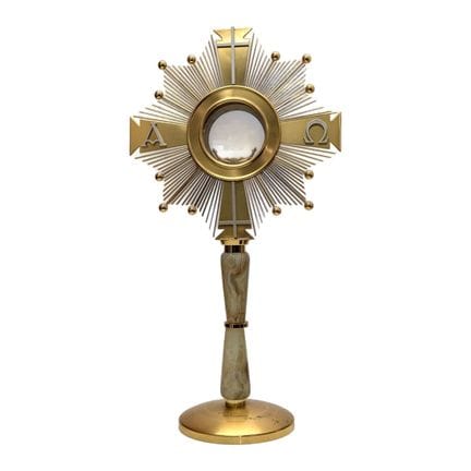 A gilded bronze and onyx monstrance consisting of 