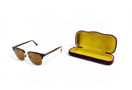 GUCCI
Paire de lunettes e soleil vintage, avec leu