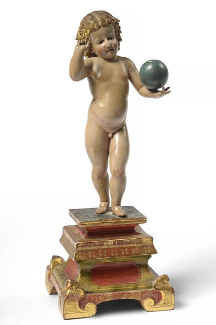 "Salvator Mundi" in legno intagliato e policromo. 