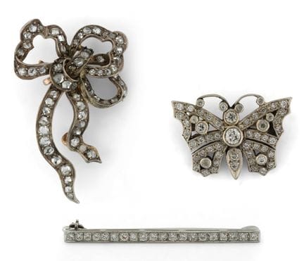 Three brooches: a "Butterfly" brooch in 9-karat ye