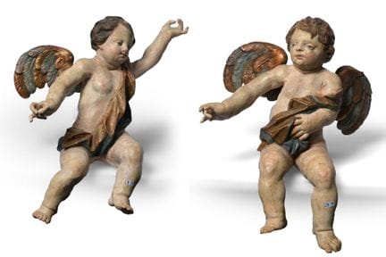 Coppia di "Angeli" in legno intagliato e policromo