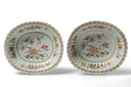 Pair of oval porcelain bowls with fluted rims and 