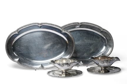 Set of four silver pieces consisting of: a pair of