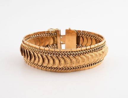 Bracelet ruban en or jaune (750) à décor d'une fri