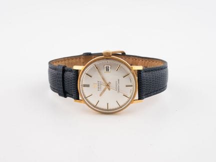 TISSOT
Men's wristwatch, round case in yellow gold