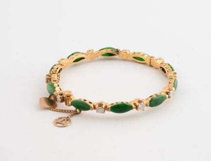 Bracelet jonc en or jaune (750) orné de cabochons 