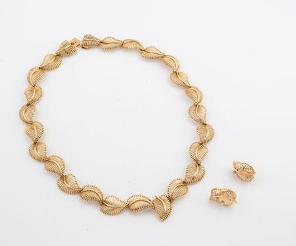 Medio conjunto de oro amarillo (750) compuesto por
