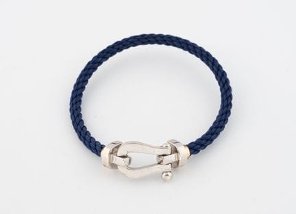 FRED
Bracelet Force 10 orné d'un cordon bleu, ferm