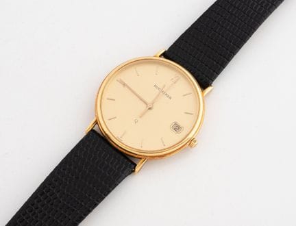 BUCHERER
Men's wristwatch.
Round yellow gold (750)