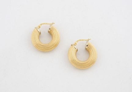 UNOAERRE
Paire de créole en or jaune (750)à motifs