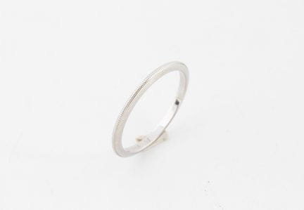 TIFFANY &amp; Co
Alianza modelo Milgrains de plati
