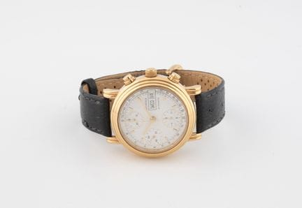 BUCHERER
Men's chronograph watch in gold-tone meta