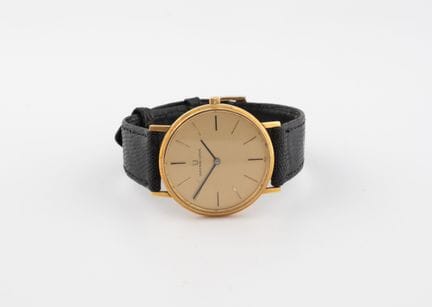 UNIVERSAL GENEVE
Men's wristwatch.
Round case in y
