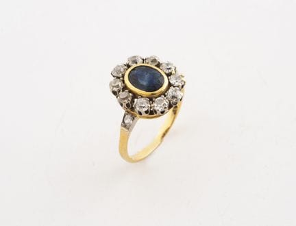 Bague marguerite en or jaune (750) et platine (850
