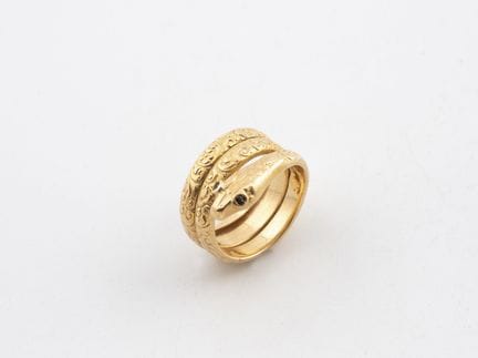 Bague du petit doigt en or jaune (750) formant un 