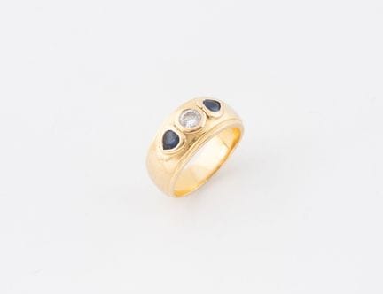 Anillo tipo diadema de oro amarillo (750) con un d