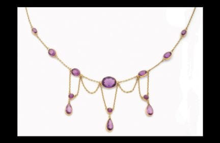 A draped necklace in yellow gold (750) made of for