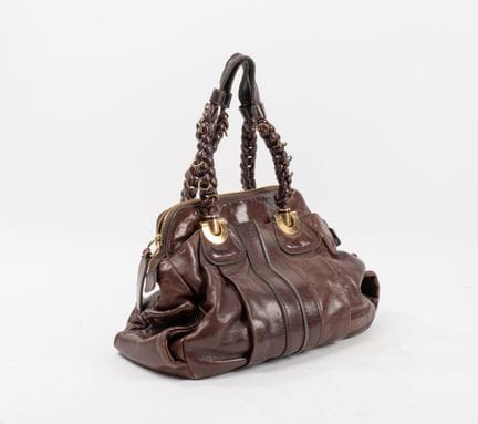 CHLOE
Sac modèle Heloïse en cuir chocolat.
Anse po