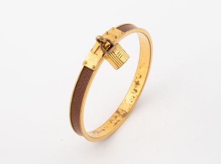 HERMES
Bracelet jonc modèle Kelly cadenas en métal